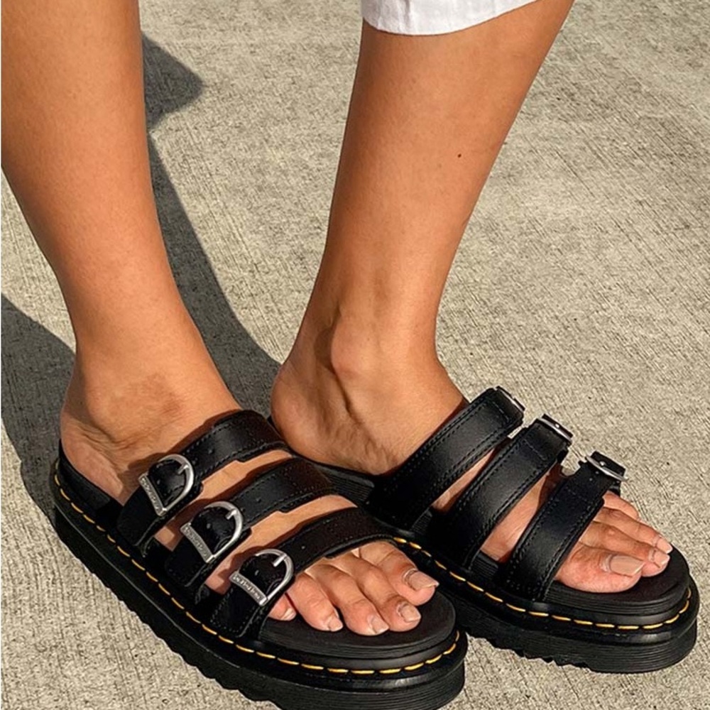 White brand- new Dr Martens sandals.